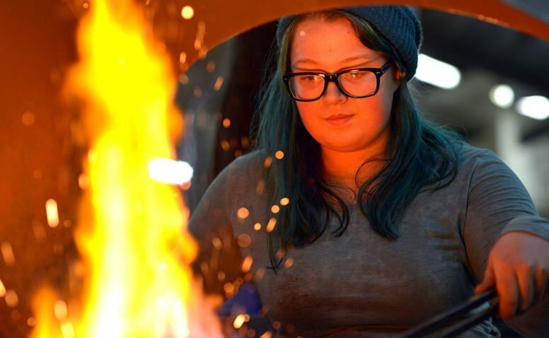 Student by the forge