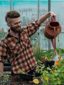 Horticulture student in greenhouse